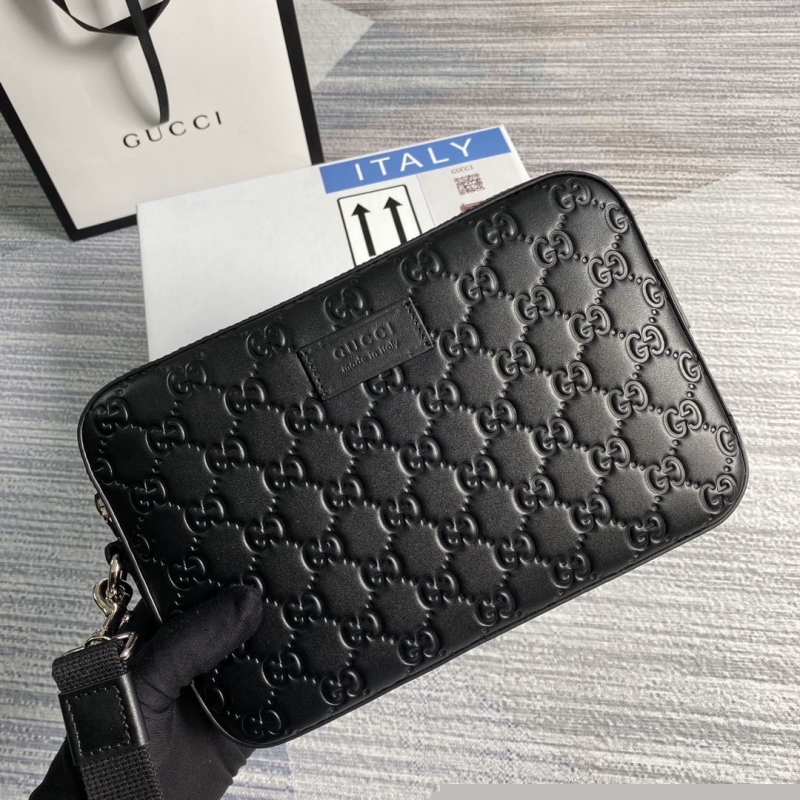 G*u*i clutch bags